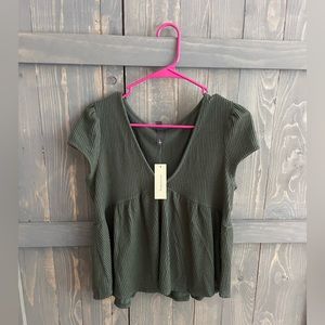 Green Francesca’s shirt